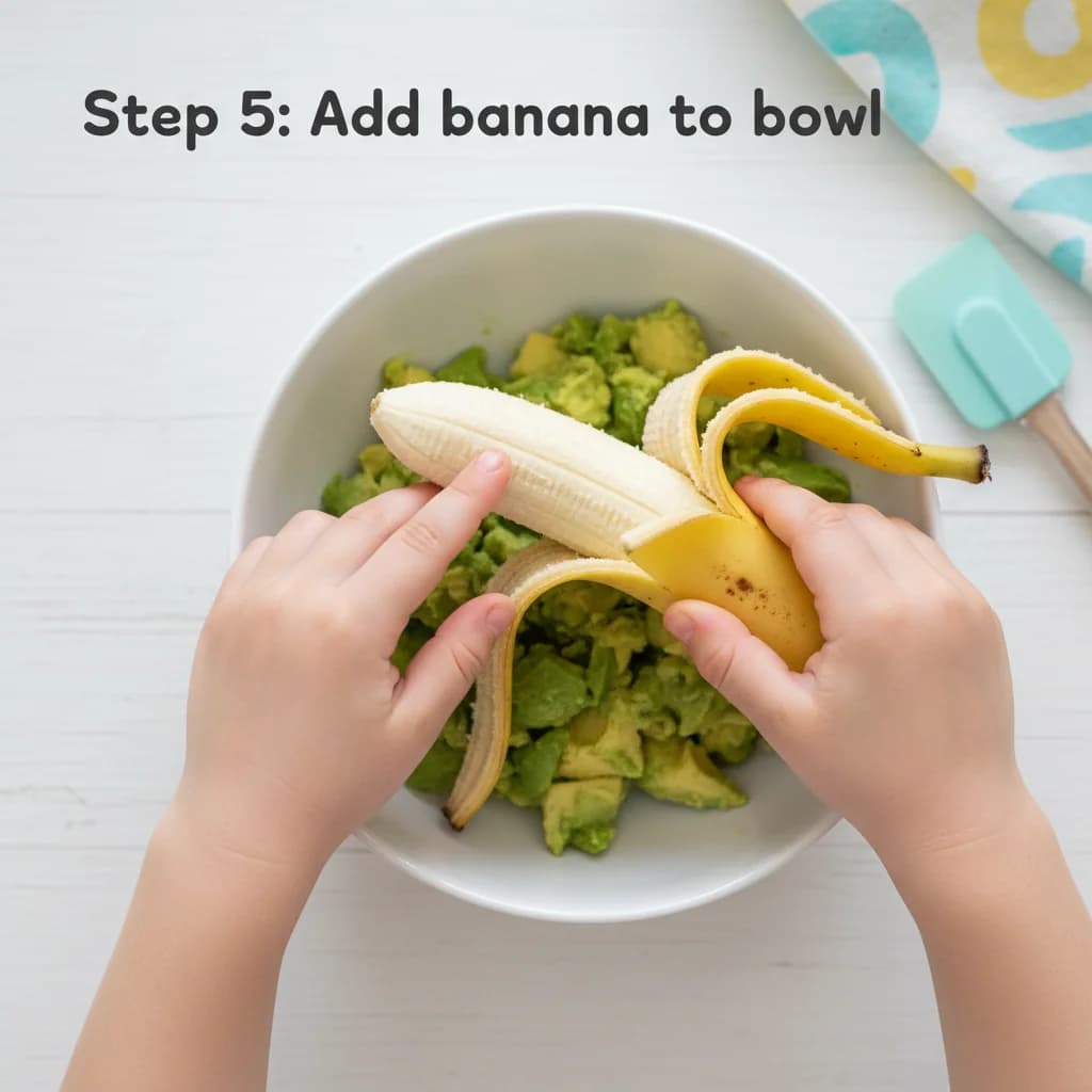 Step 5: Add banana to bowl: Place the peeled banana half into the bowl with the avocado. for Avocado & Banana Mash: Creamy First Food