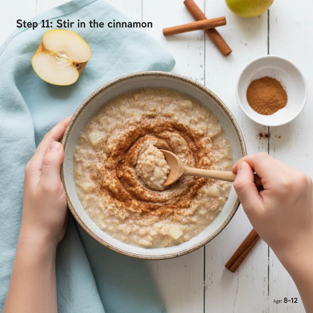 Step 11: **Stir in the cinnamon:** Stir the cinnamon into the oatmeal until it is well combined. for Cozy Pear & Cinnamon Oatmeal for Baby