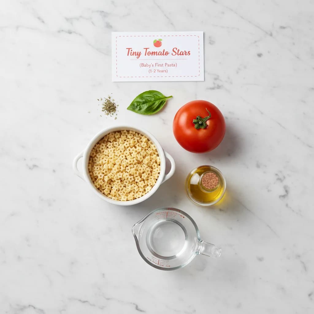 All ingredients needed for Tiny Tomato Stars (Baby's First Pasta) arranged on a clean surface